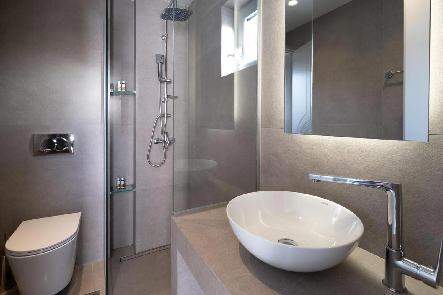 Private bathroom with shower at Mochlos Blue