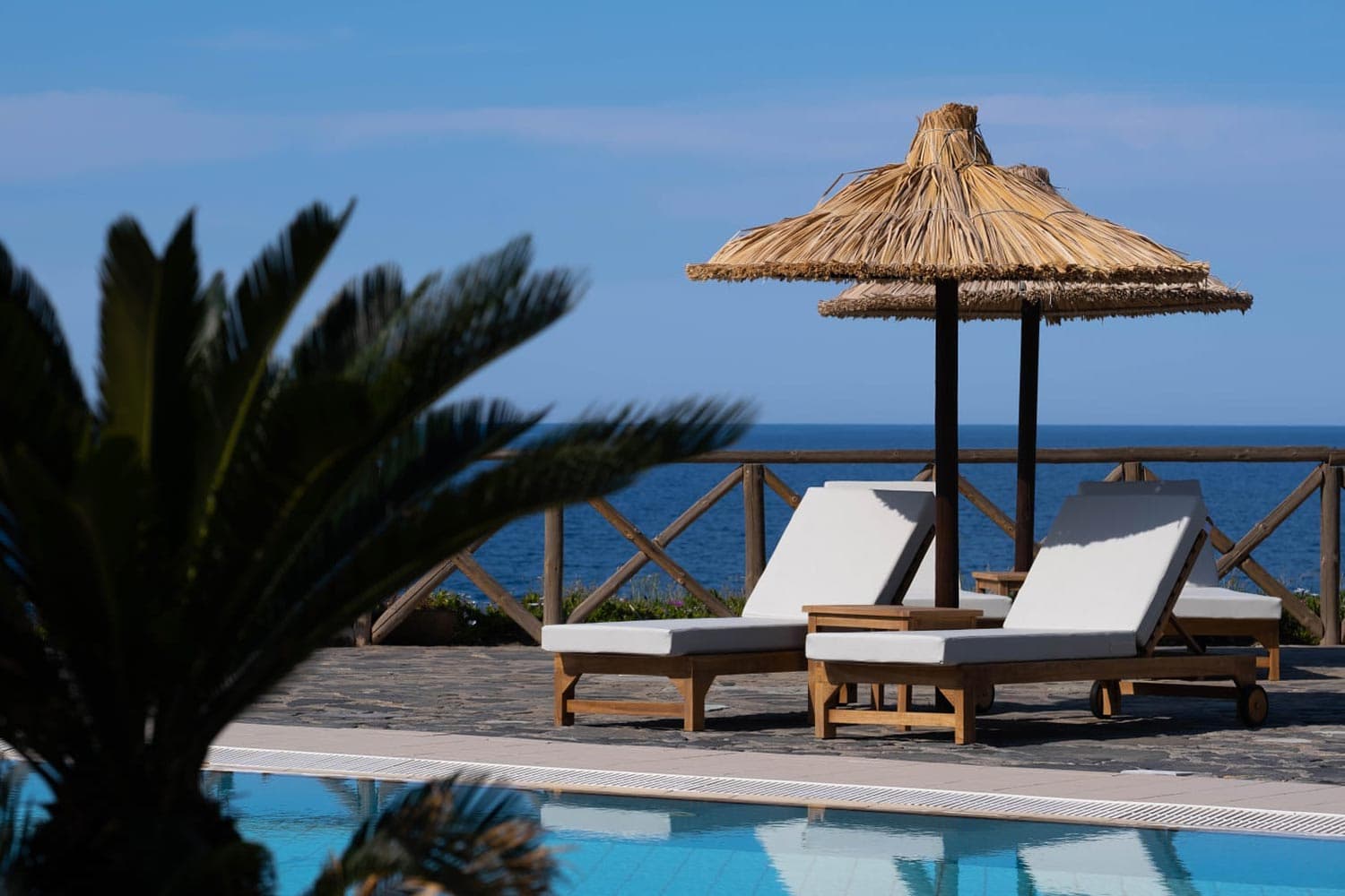 The swimming pool at Mochlos Blue with the Aegean Sea in the background